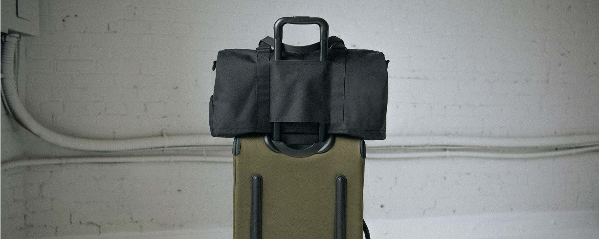 Bags with trolley sleeves online