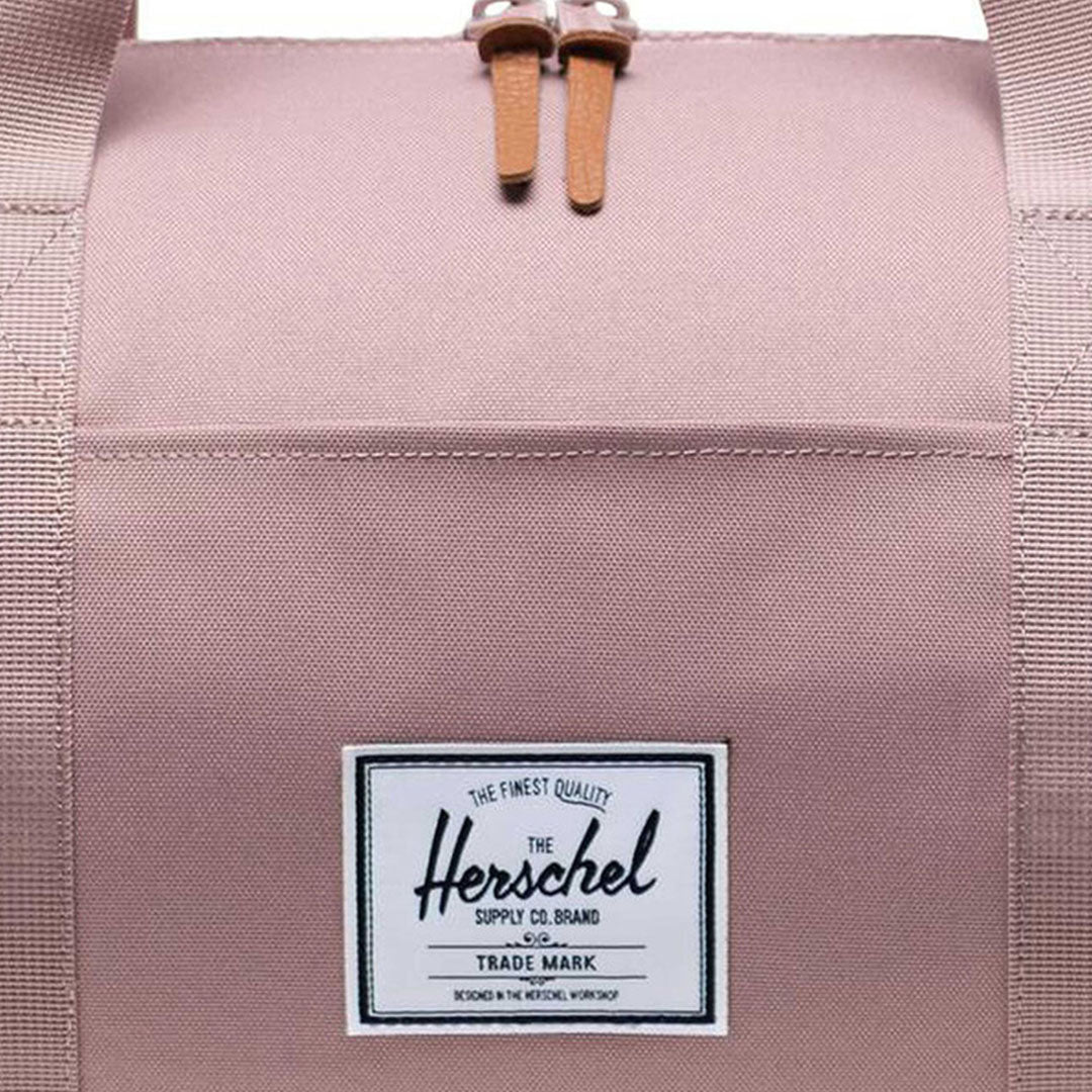 Pink herschel clearance duffle bag